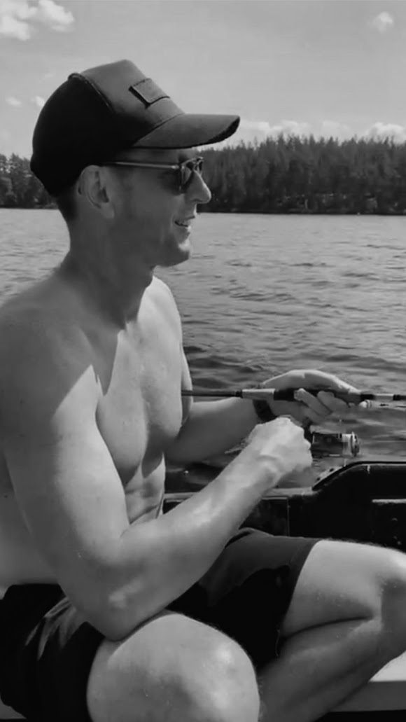 Marcus Nestor fishing from a boat